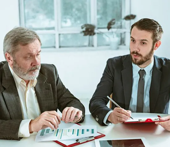 Accountant Checking Balance Sheets